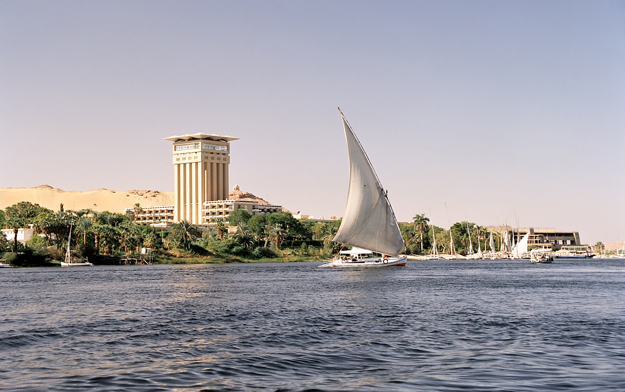 Felucca sailing past Elephantine Island at Aswan on the Nile, Egypt