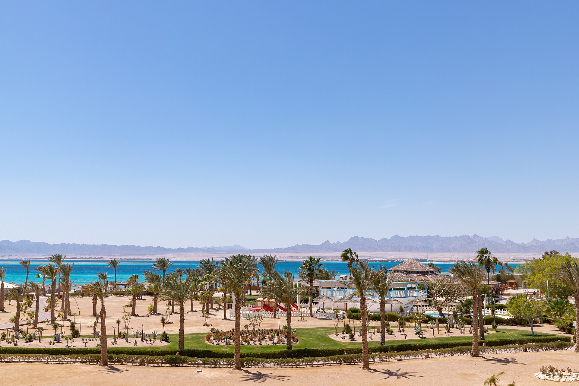 Wide sandy beach and calm Red Sea water at Soma Bay, Egypt