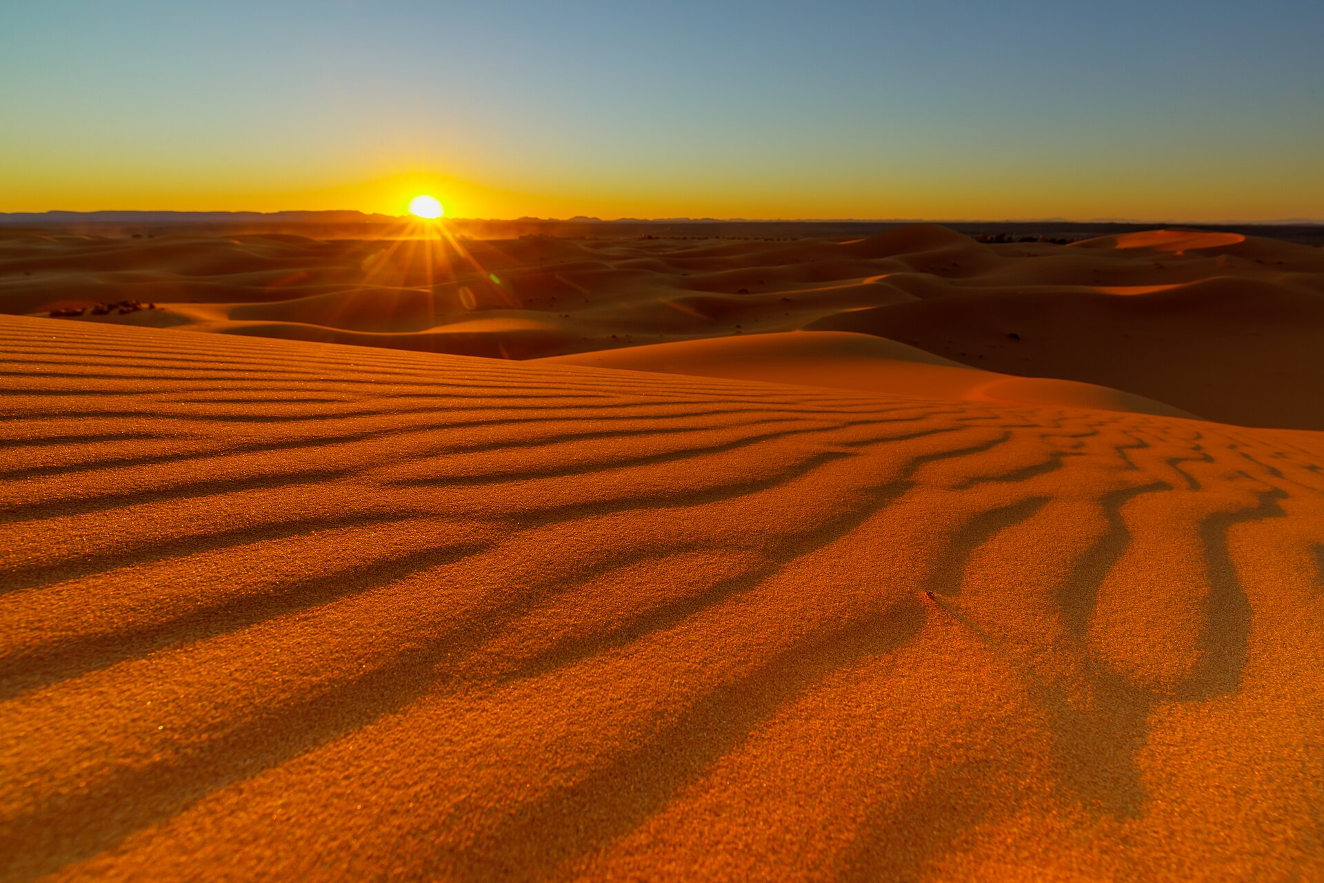 The Erg Chebbi dunes at sunset near Merzouga, destination of the Marrakech to Merzouga transfer